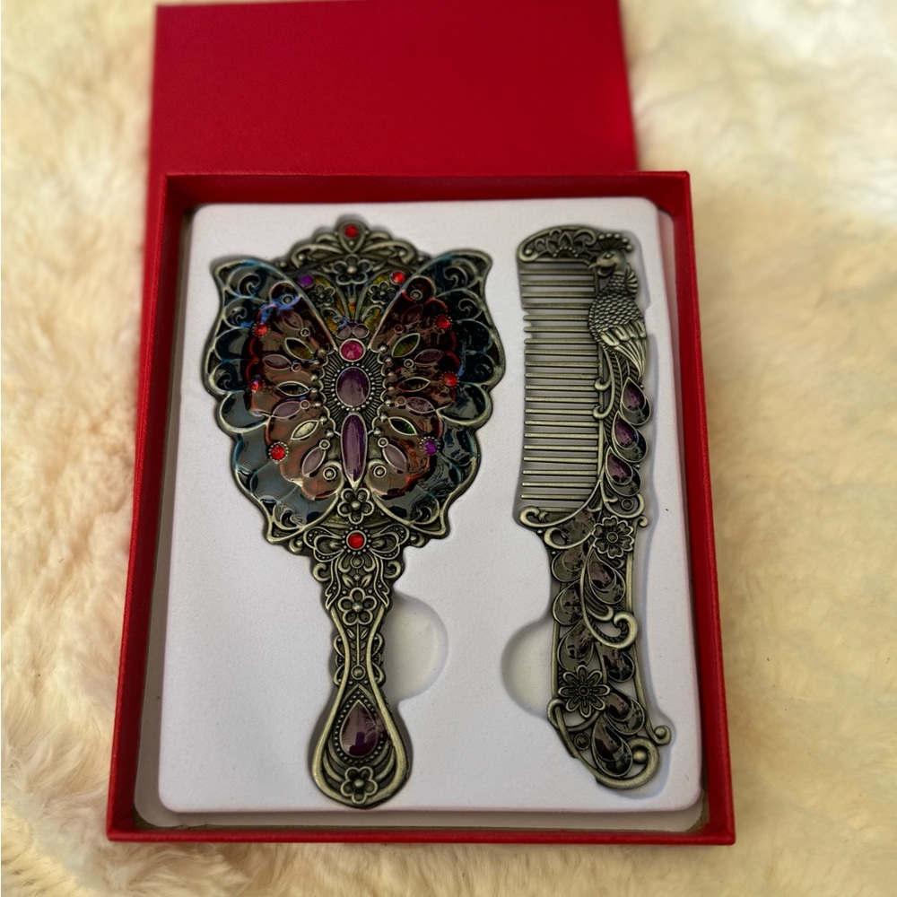 Butterfly mirror and comb set.